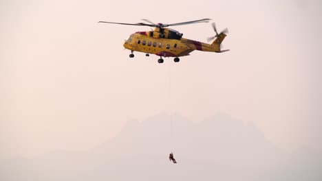 canadian helicopter search and rescue operation in mountains