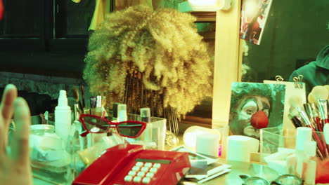 mirror reflection of clown in dressing room