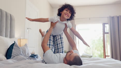 Father,-child-and-airplane-in-home-happy-for-play