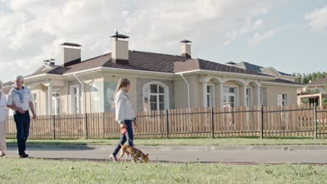 little girl and family walking in countryside