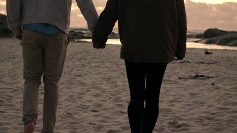 walking together at sunset