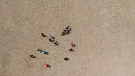 Overhead-Shot-Of-Horse-Riding-Hitting-Hard-his-Horse-Playing-Rodeo