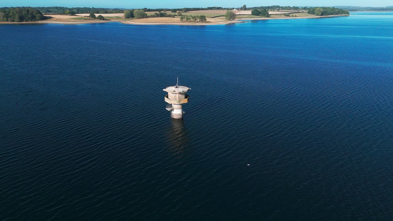 Normanton Church on Rutland Water, serene summer day, aerial view