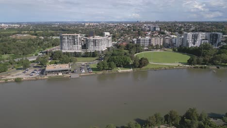 aerial drone shot over cooks river in the suburb of sydney, australia