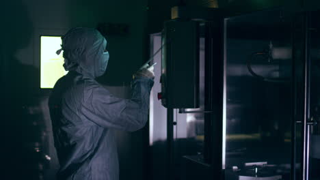 pharmaceutical factory worker operate control panel. pharmaceutical technology