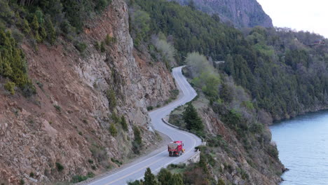 aerial view of snowplows on the seven lakes road. (camino de los siete lagos) patagonia, argentina. 4k.
