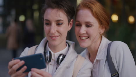 portrait attractive girl friends taking selfie photo using samrtphone posing enjoying making faces having fun together happy successful business women slow motion