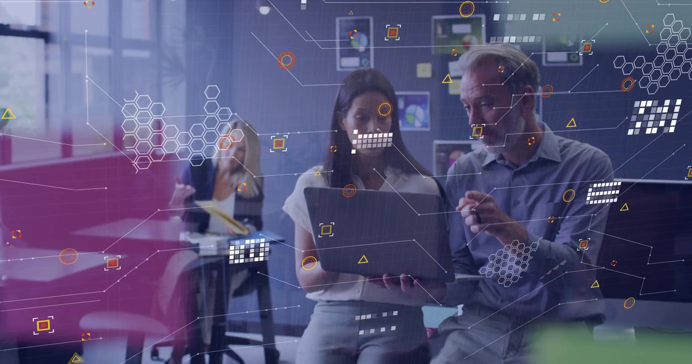 Man pointing at laptop, woman shifting laptop, HUD hexagons increasing, highlighting business data