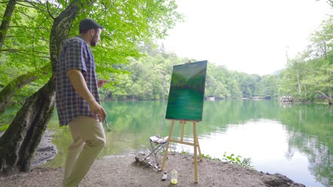 Painting on canvas using oil paints.