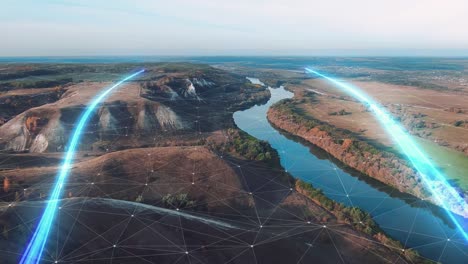 vista aérea de un río que fluye a través de un paisaje con superposición de conectividad digital