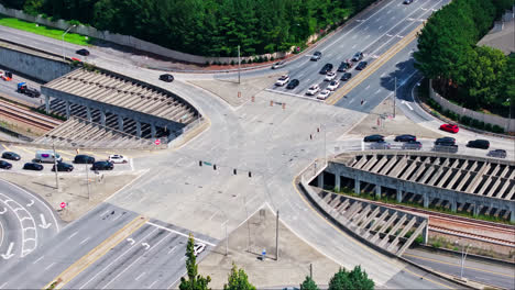 cars starting to drive after stopping on overpass junction in american city