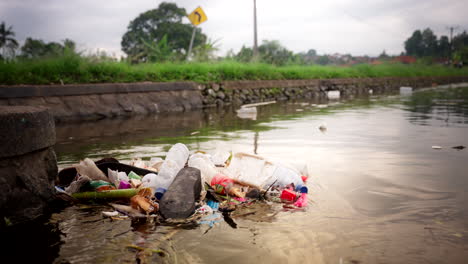 beauty of bali waterways spoiled by human waste, environmental pollution