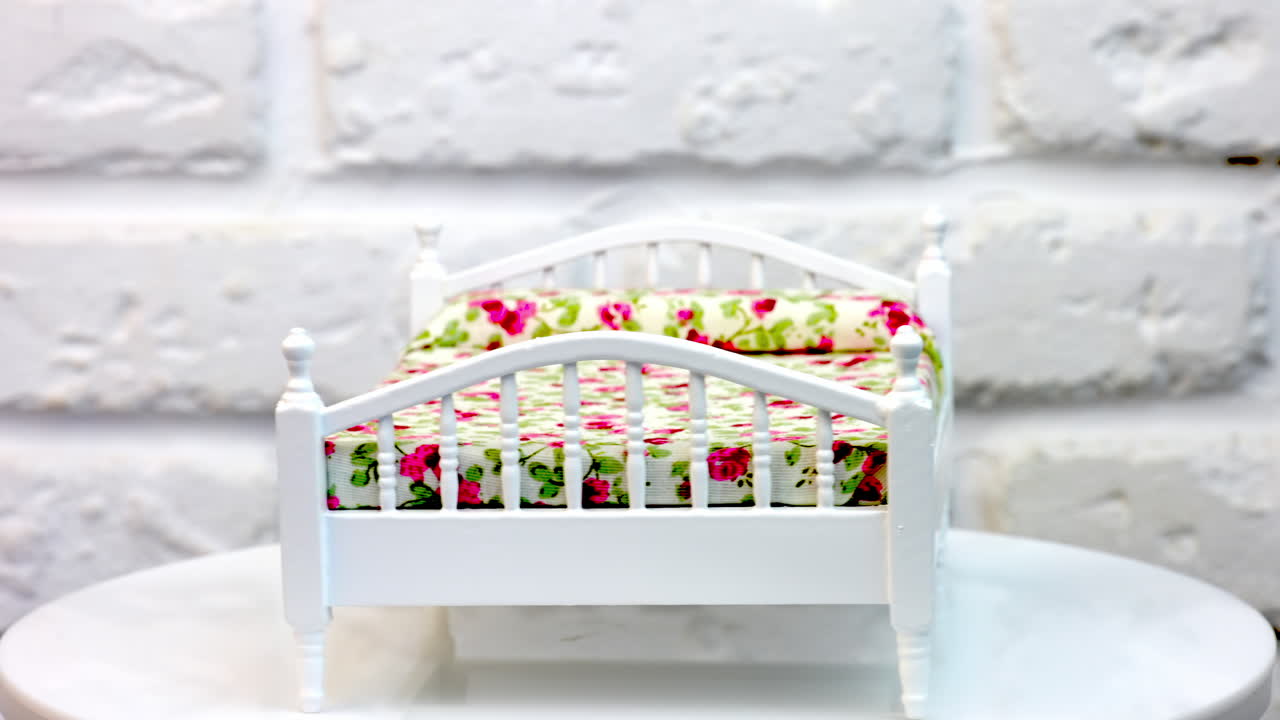 Tiny decoration bed for toy. Miniature furniture for dollhouse.