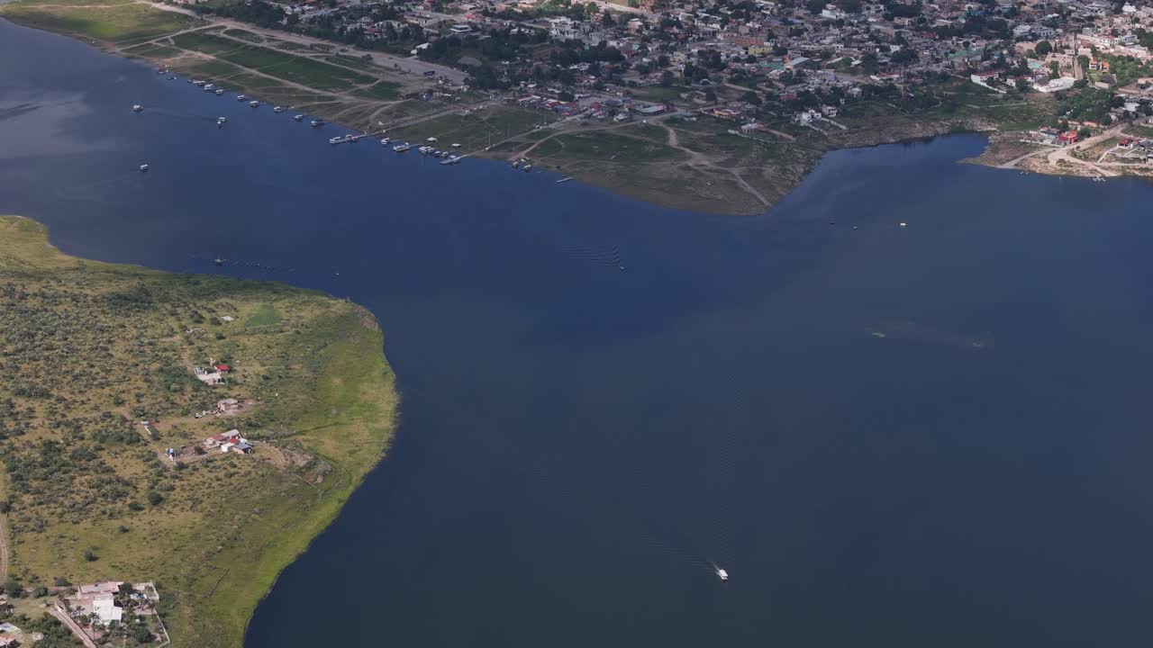 High-altitude drone footage of Calles Dam in San José de Gracia, Aguascalientes, Mexico. Part of the Magic Town program, highlighting scenic reservoir and surrounding landscape