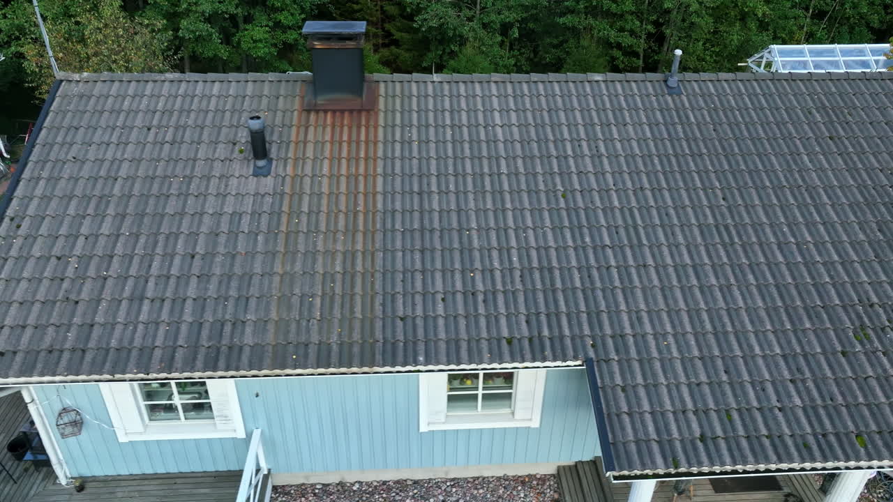 Aerial view of details on the roof of a detached house, autumn day in Finland