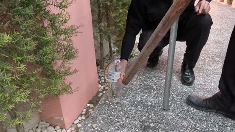 methodical capture of a snake using a bottle.