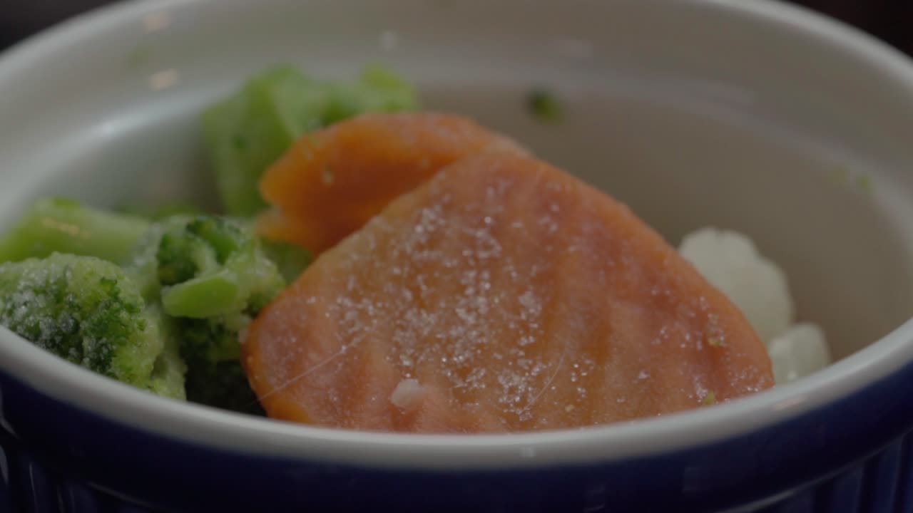 Colorful vegetables in bowl evoke fresh, healthy dining mood