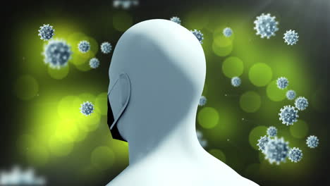 animation of multiple covid 19 cells floating around human head with face mask on green background