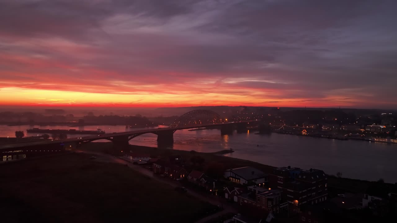 Drone shot of the Waalbrug bridge in early morning light