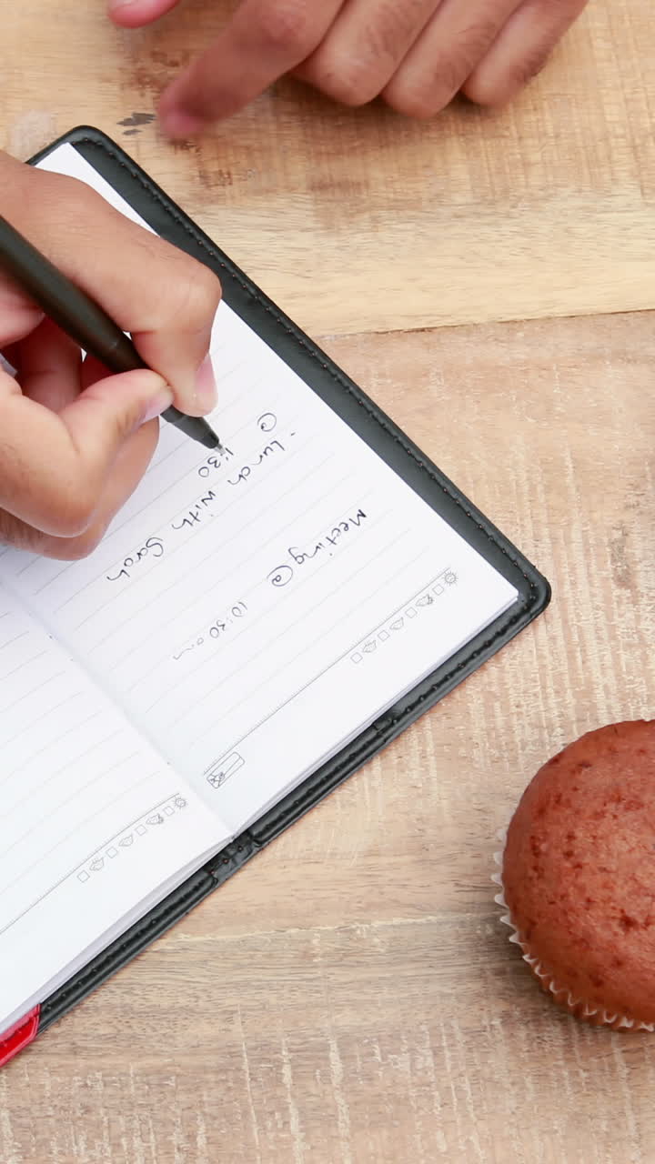 Overhead of man working at desk