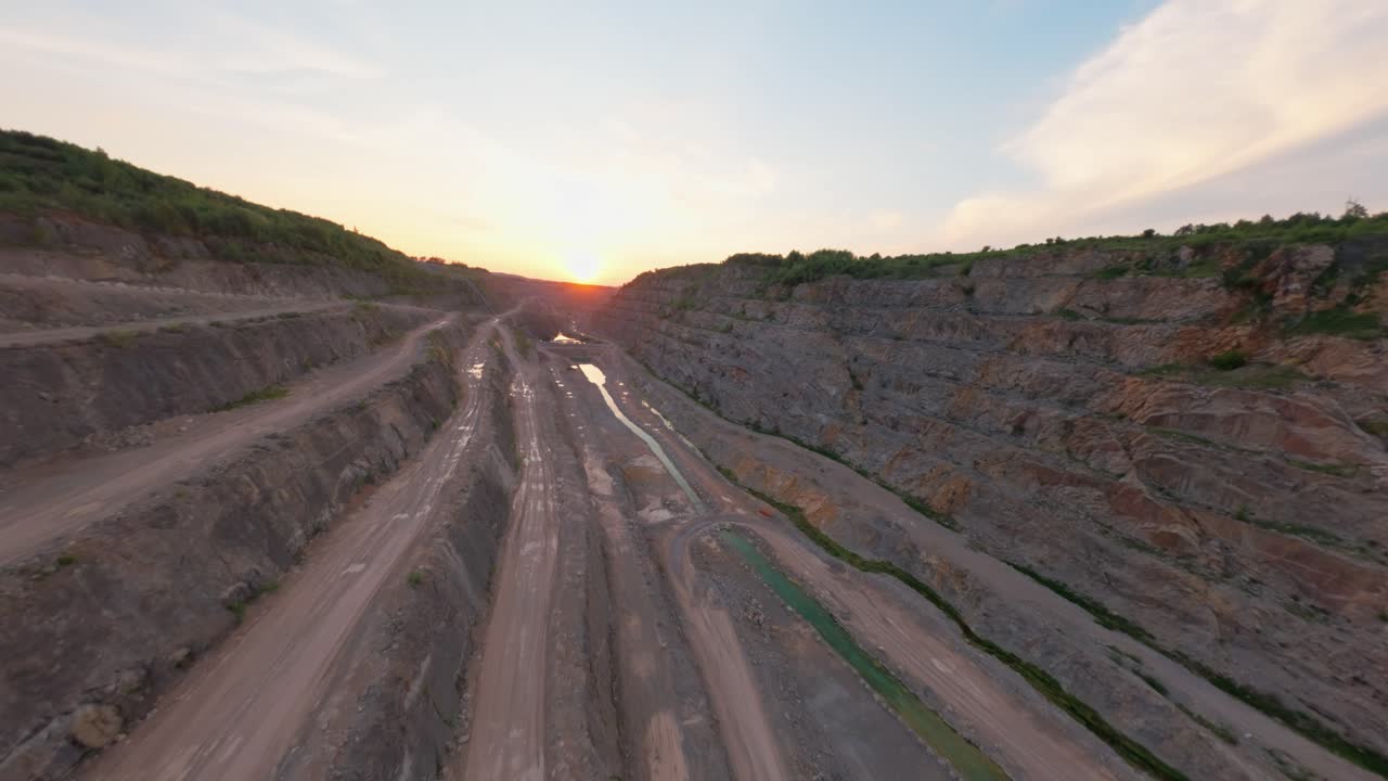 Drone over Devonian limestone mine with eroded rock terrace