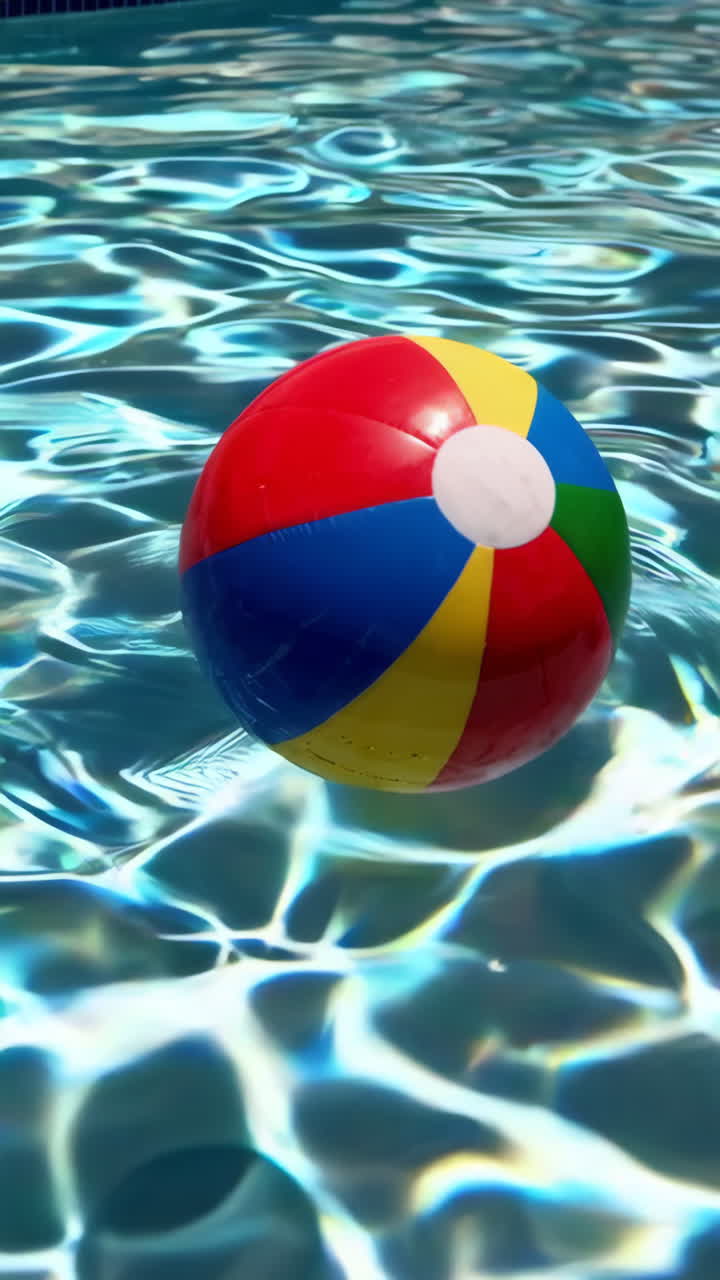 Colorful Beach Ball in a Swimming Pool