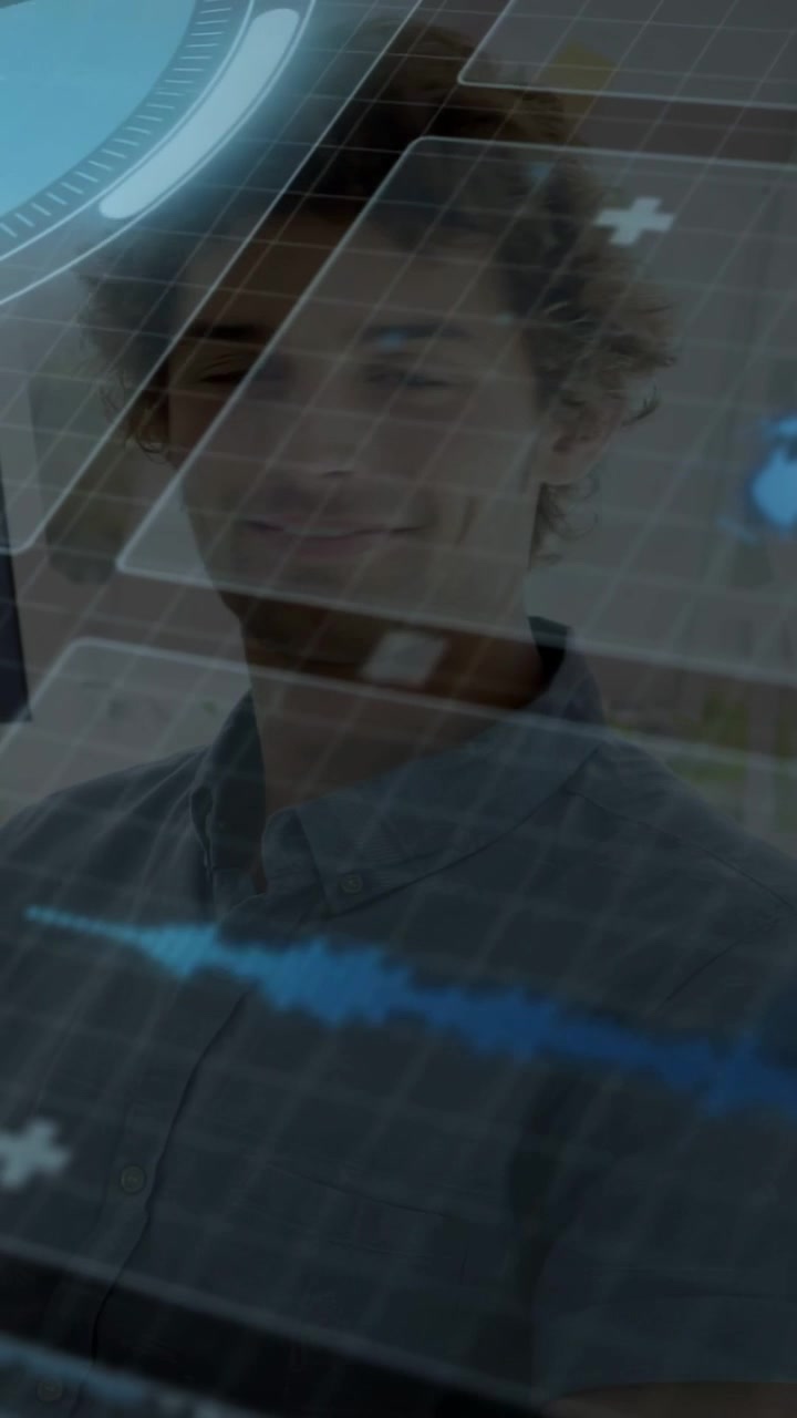 Vertical video: Man standing, medical HUD scanning globe and ECG over, eyes opening turning smiling
