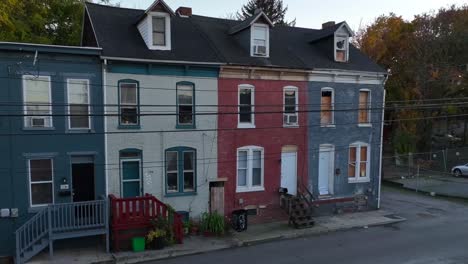 colorful row houses with gabled roofs at dusk