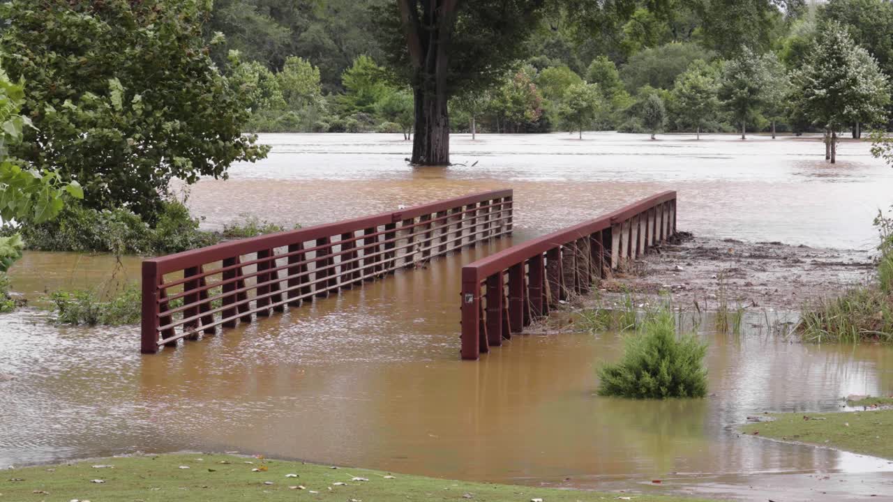 Hurricane Helene flooding a bridge on a golf course in Atlanta, Georgia.