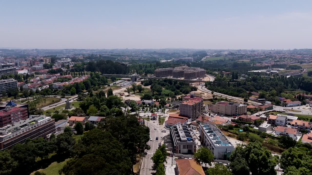 aerial view of Maia city Portugal with urban buildings roads and surrounding tree-lined areas