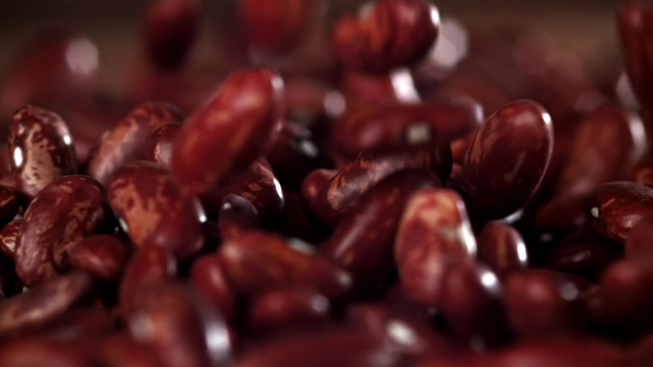 Close Up of Red Kidney Beans Falling in Slow Motion