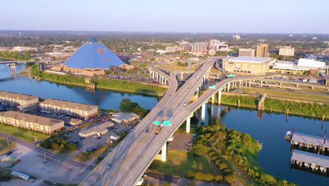 Aerial-approaching-Memphis-Tennessee-across-the-Mississippi-River-with-Memphis-pyramid-background