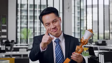 businessman celebrating award win