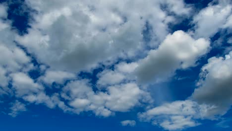 clouds are moving in the blue sky. timelapse