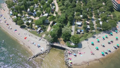 aerial shot of camping baia verde shore at lake garda, italy