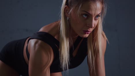focused female athlete in workout