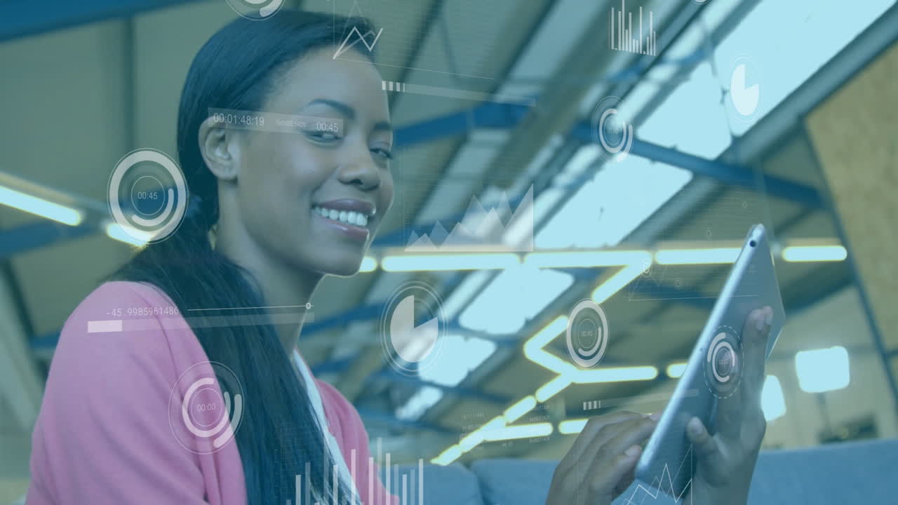 Animation of financial data processing over african american businesswoman using tablet