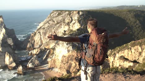 Relaxed-man-wearing-camping-backpack