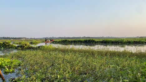 scene of boat with passenger travelling in bortirbil,west bengal in early morning day light