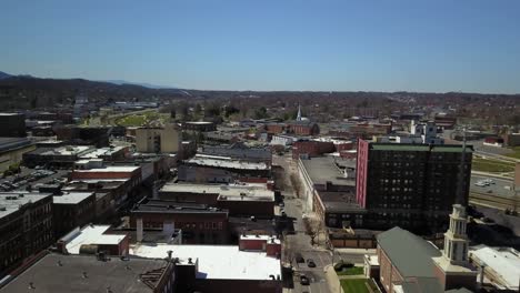 aerial flying over johnston city tennessee skyline....4k