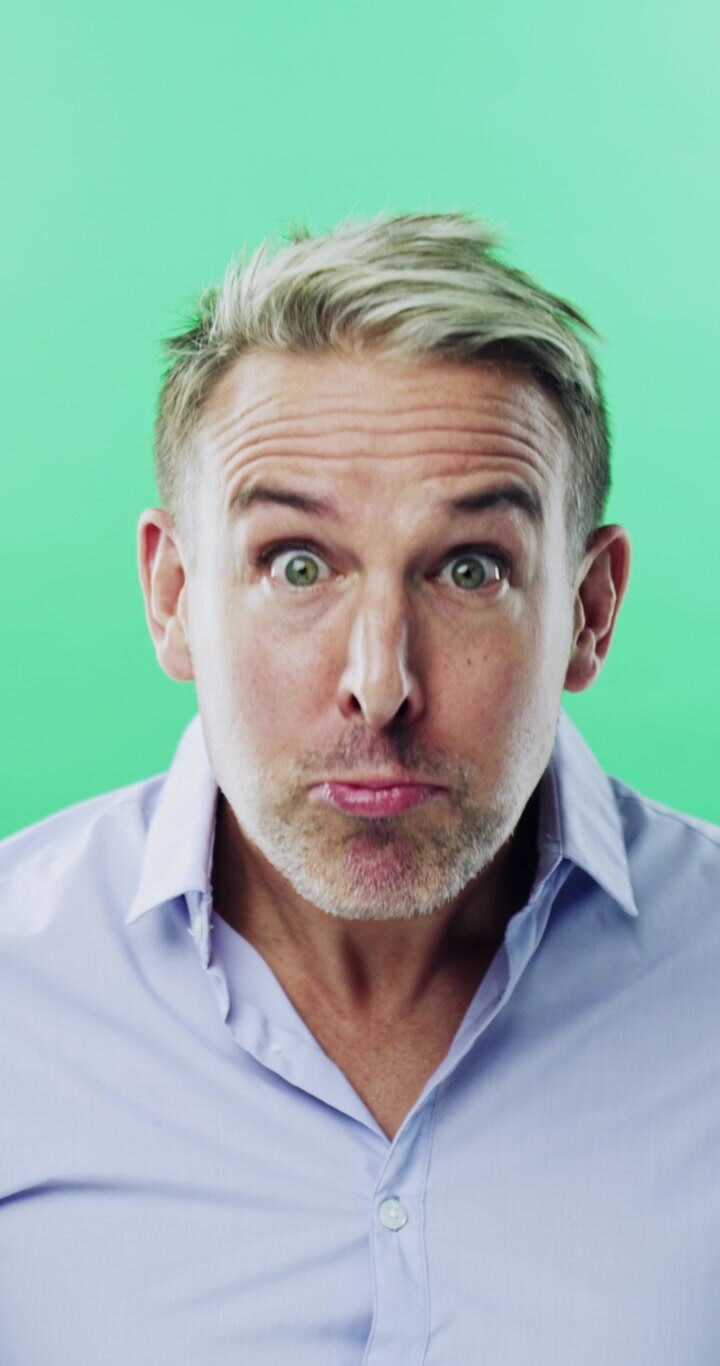 Man Making Funny Faces Against Green Screen Background