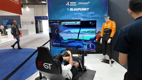 a gaming simulator setup at the ifa berlin showcases blaupunkt technology in immersive racing
