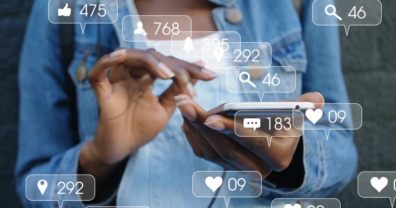 woman holding phone tapping causing floating likes or comments multiplying showing social media grow