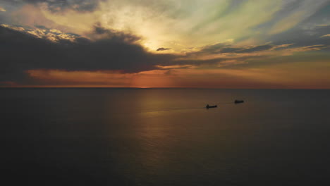 amazing view of two big ships sailing during a majestic sunset