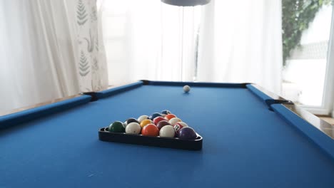 billiard balls in triangle for pyramid on pool table