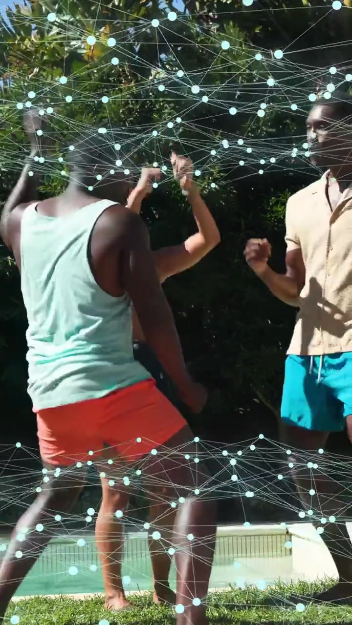 Vertical video: Trio dancing poolside left man initiating moves sparking digital overlay for ads