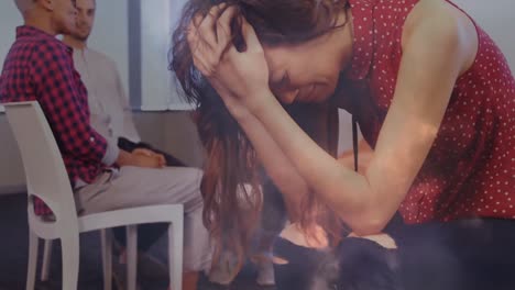 composite video of thunderstorm in dark sky against stressed caucasian woman at office