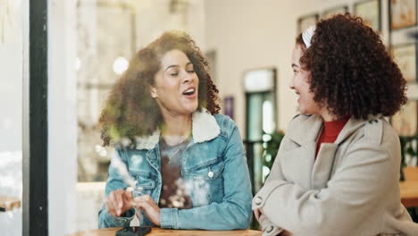 two friends chatting in a cafe