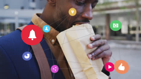 red de iconos digitales contra el hombre afroamericano que tiene un bocadillo en la calle