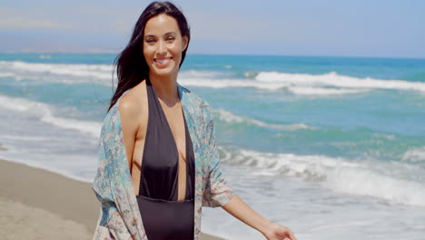 Pretty-Young-Woman-Having-a-Vacation-at-the-Beach